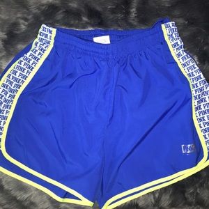 VS Pink running shorts.